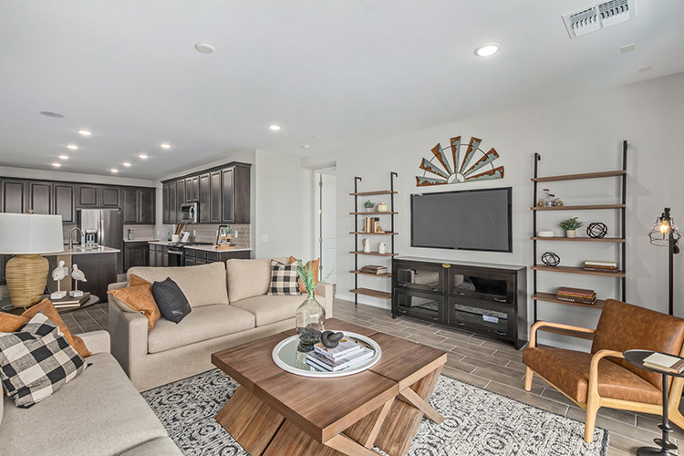 A living room with a tv and couches.