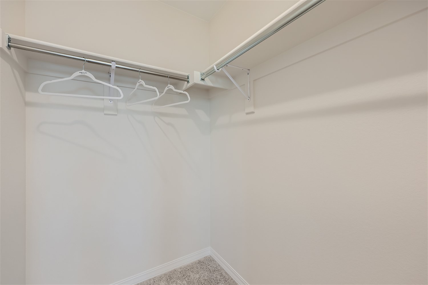 A white ceiling with a light fixture.