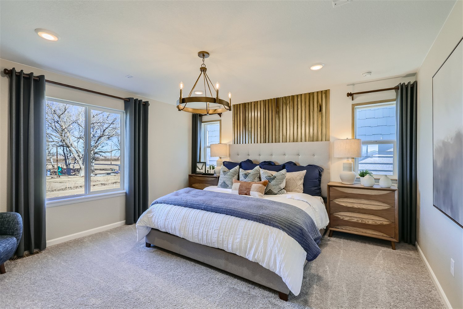 A bedroom with a bed and a window.