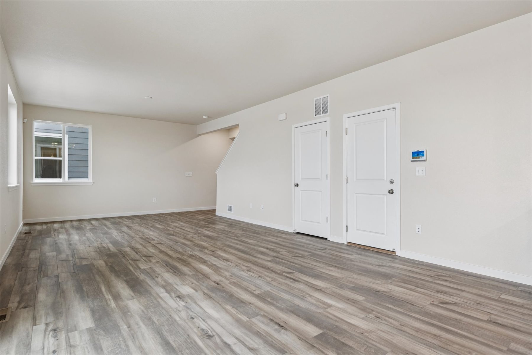 A room with white doors.