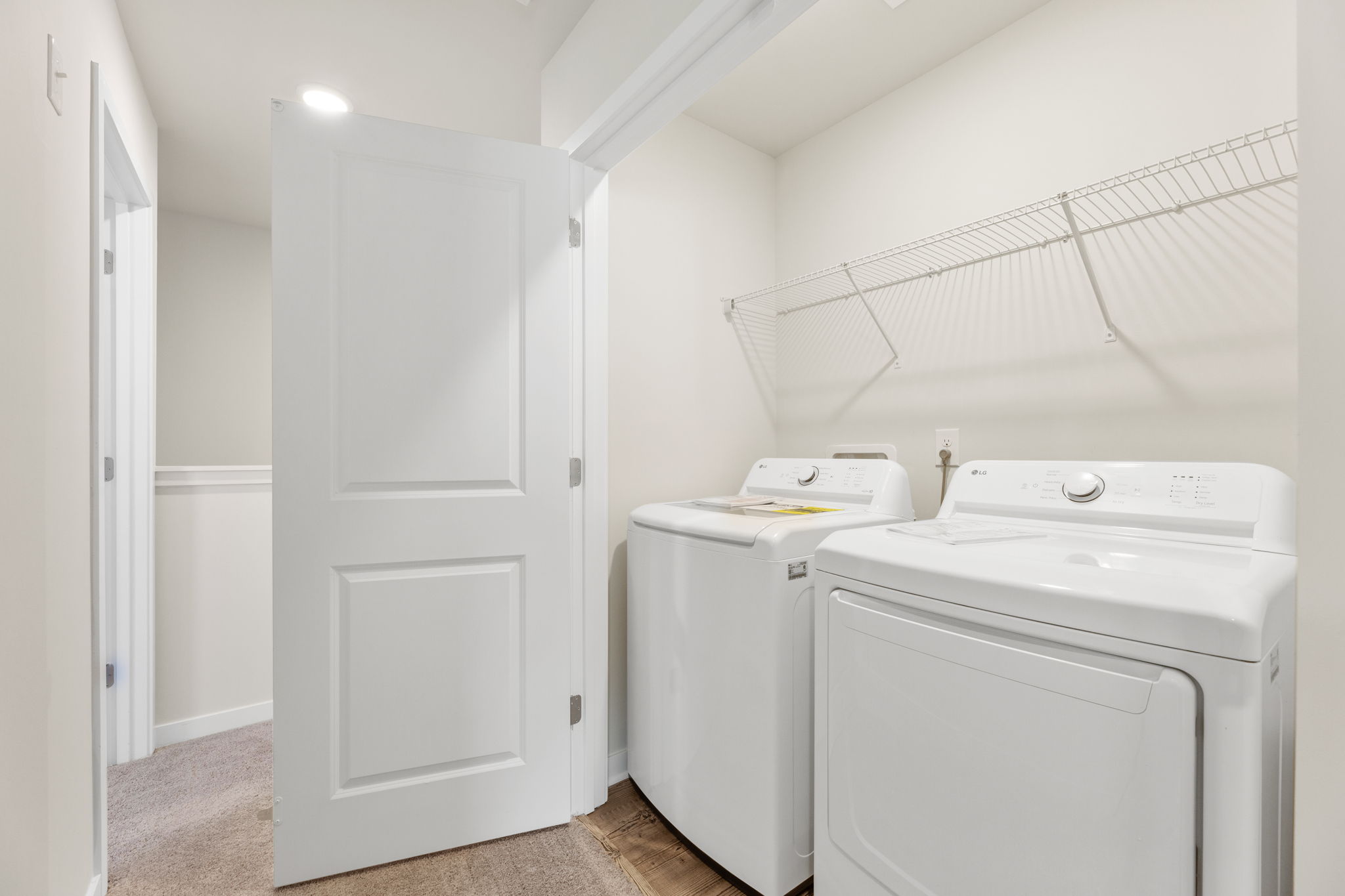 A laundry room with a washer and dryer.