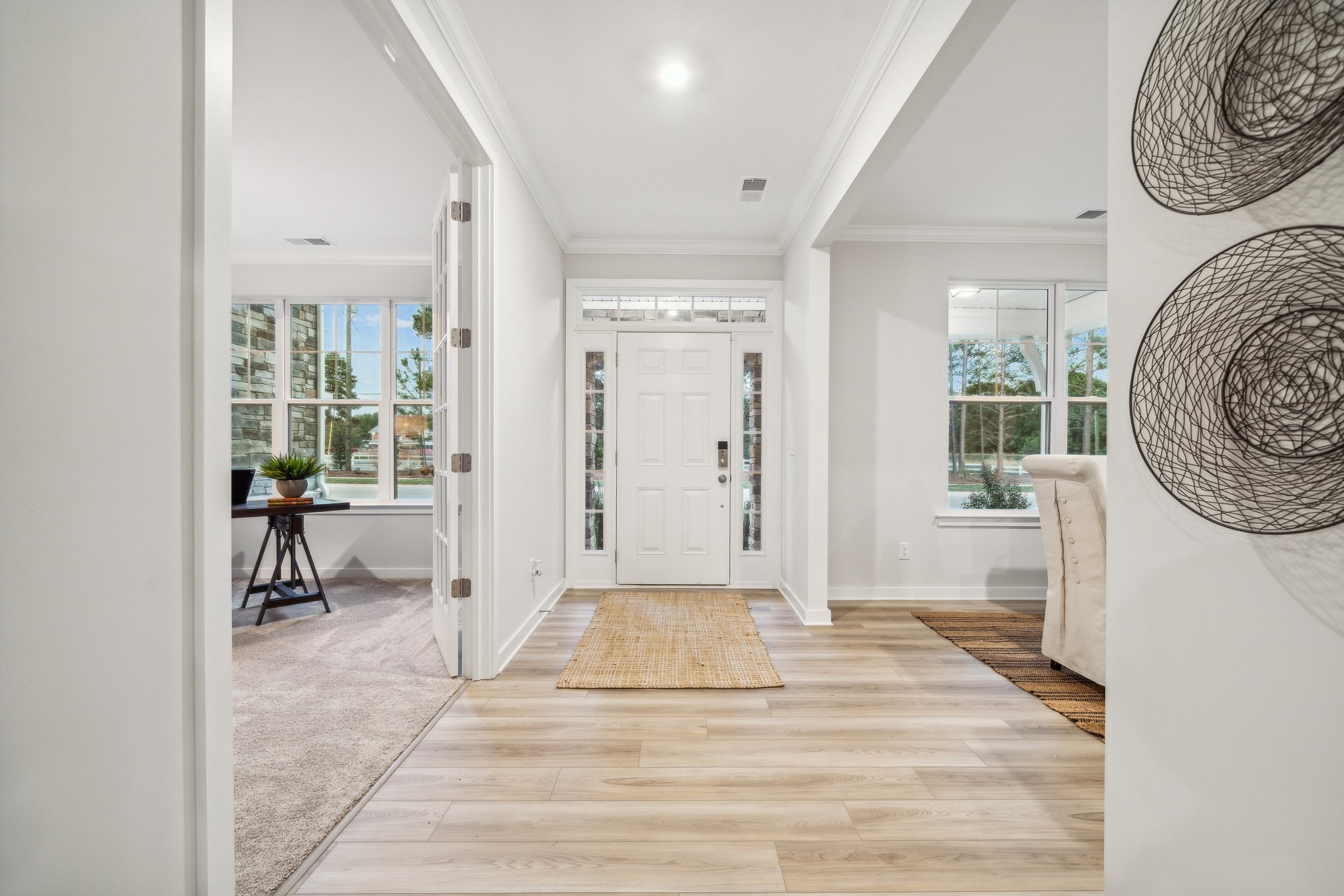 A room with a wood floor and a wood floor.