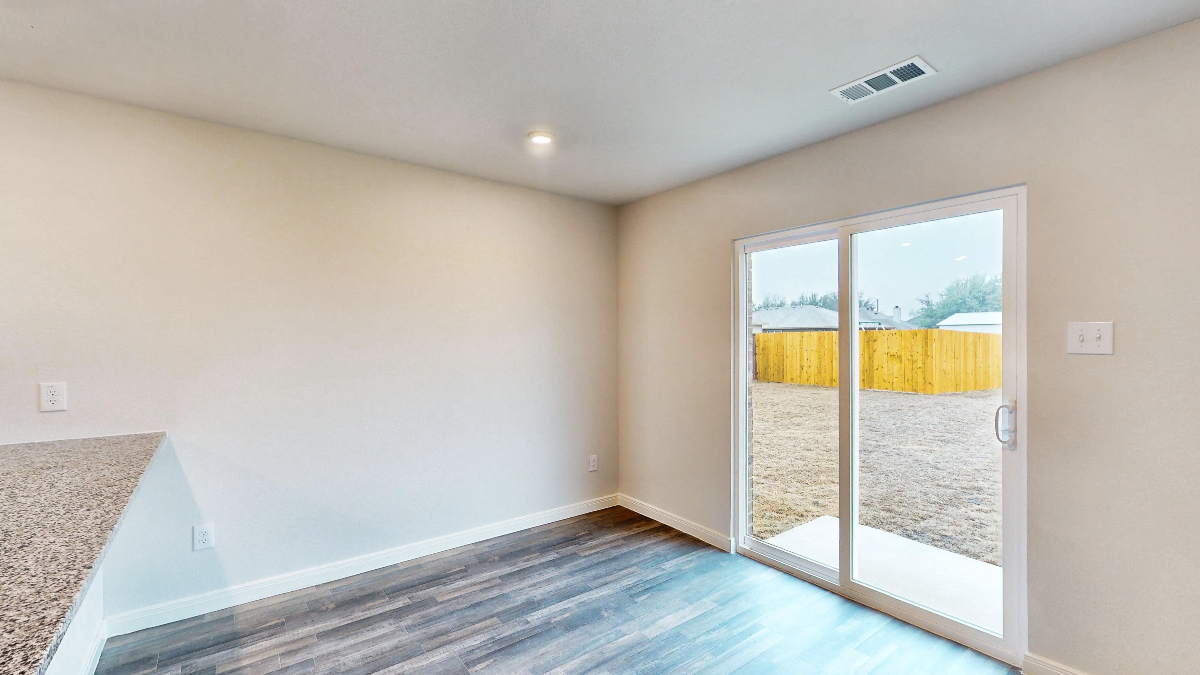 A room with a glass door.