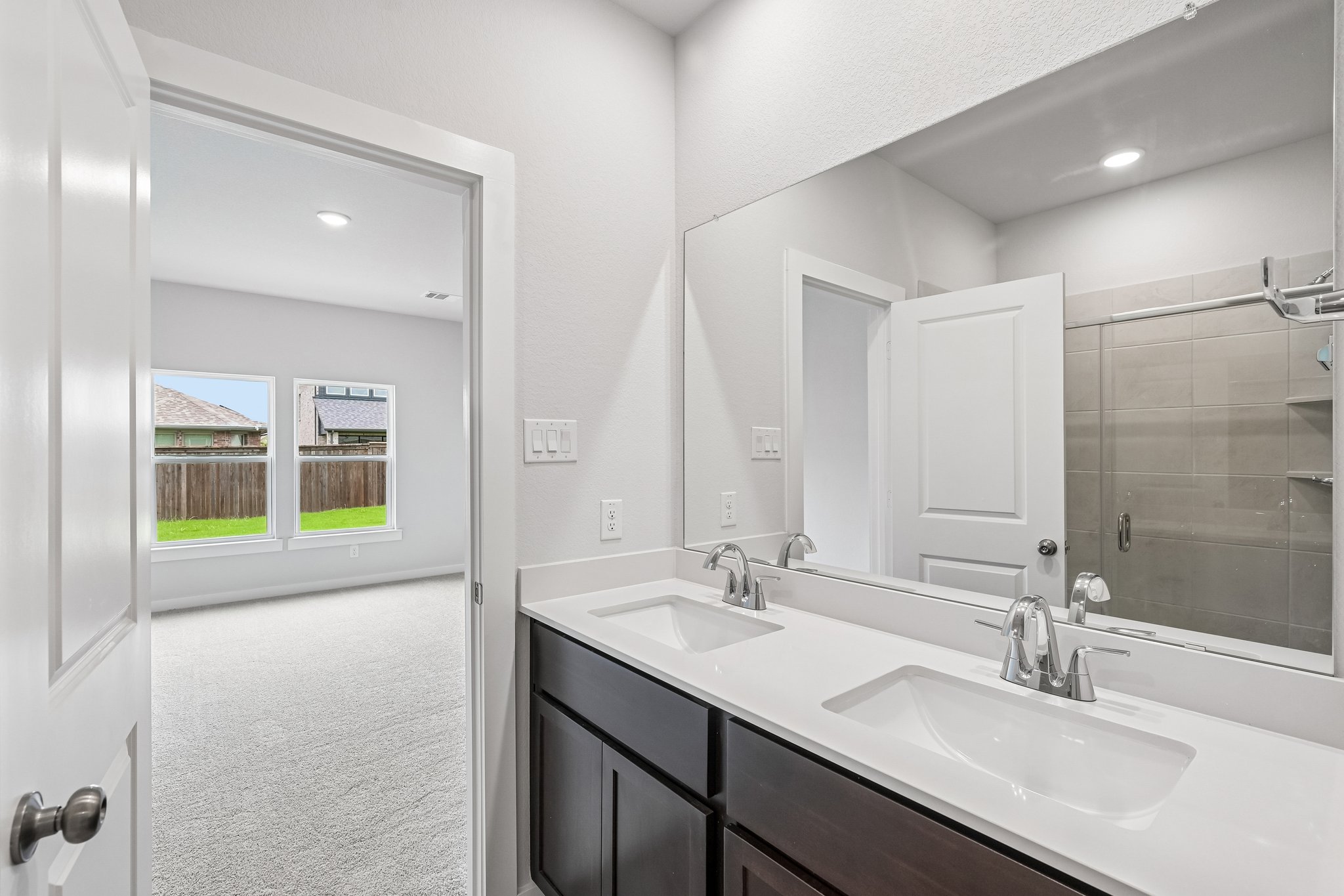 A bathroom with two sinks.