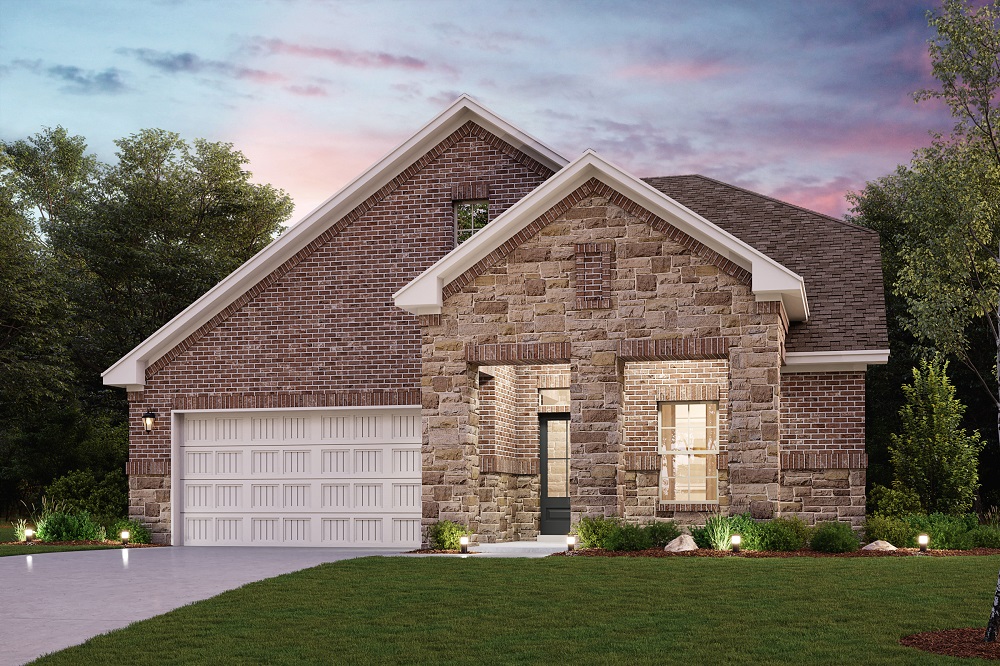 A brick house with a garage.