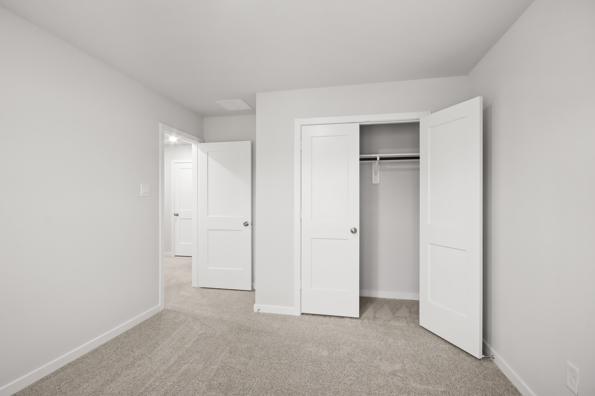 A room with white doors.
