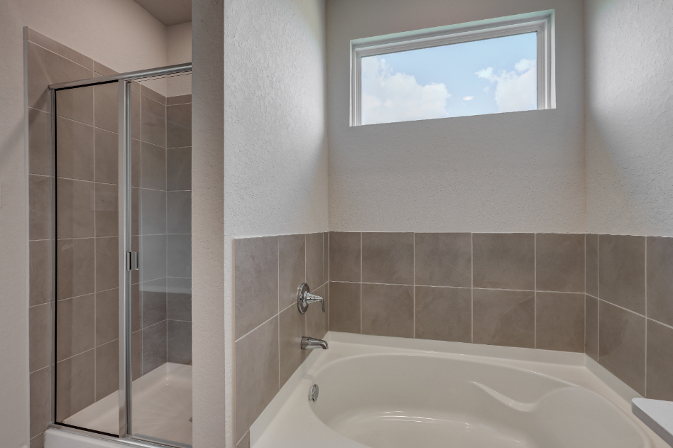 A bathroom with a glass shower.