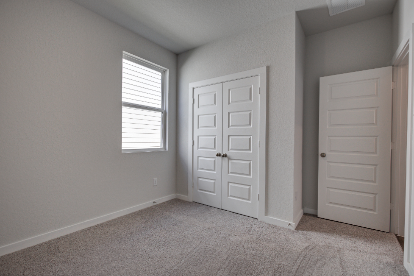 A room with white doors.