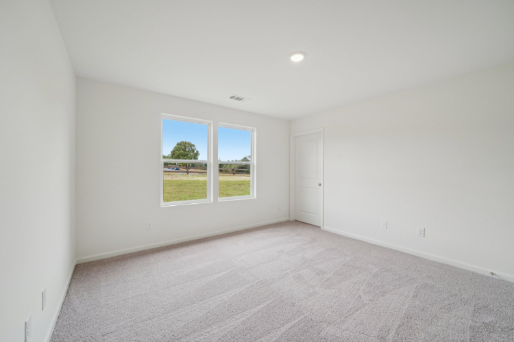 A room with a large window.