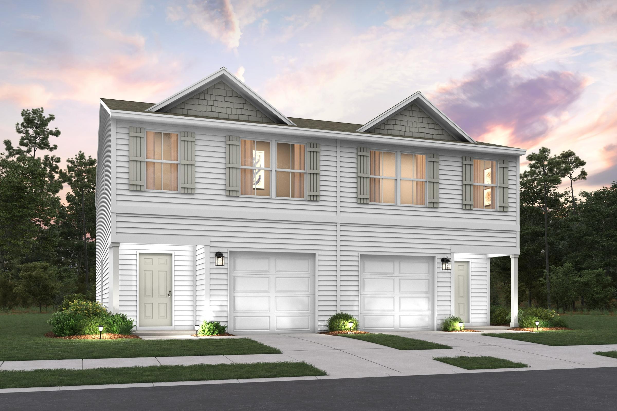 A house with garages and trees.